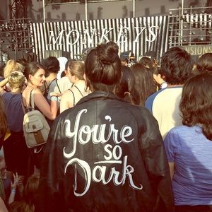 hand painted You’re So Dark vegan leather jacket